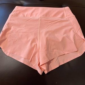 Athleta High Rise Run With It Shorts 2.5. NWOT.